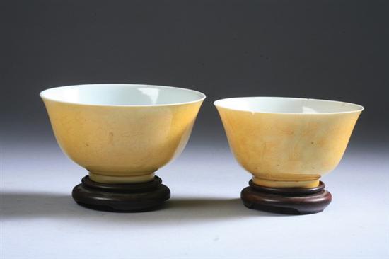 Appraisal: TWO CHINESE MONOCHROME YELLOW PORCELAIN BOWLS Daoguang underglazed blue seal