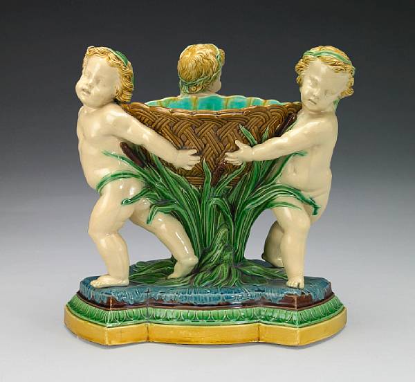 Appraisal: A Minton majolica figural centerpiece date code for impressed MINTON