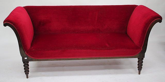 Appraisal: A SMALL MAHOGANY RED DRAYLON UPHOLSTERED SOFA with scroll ends