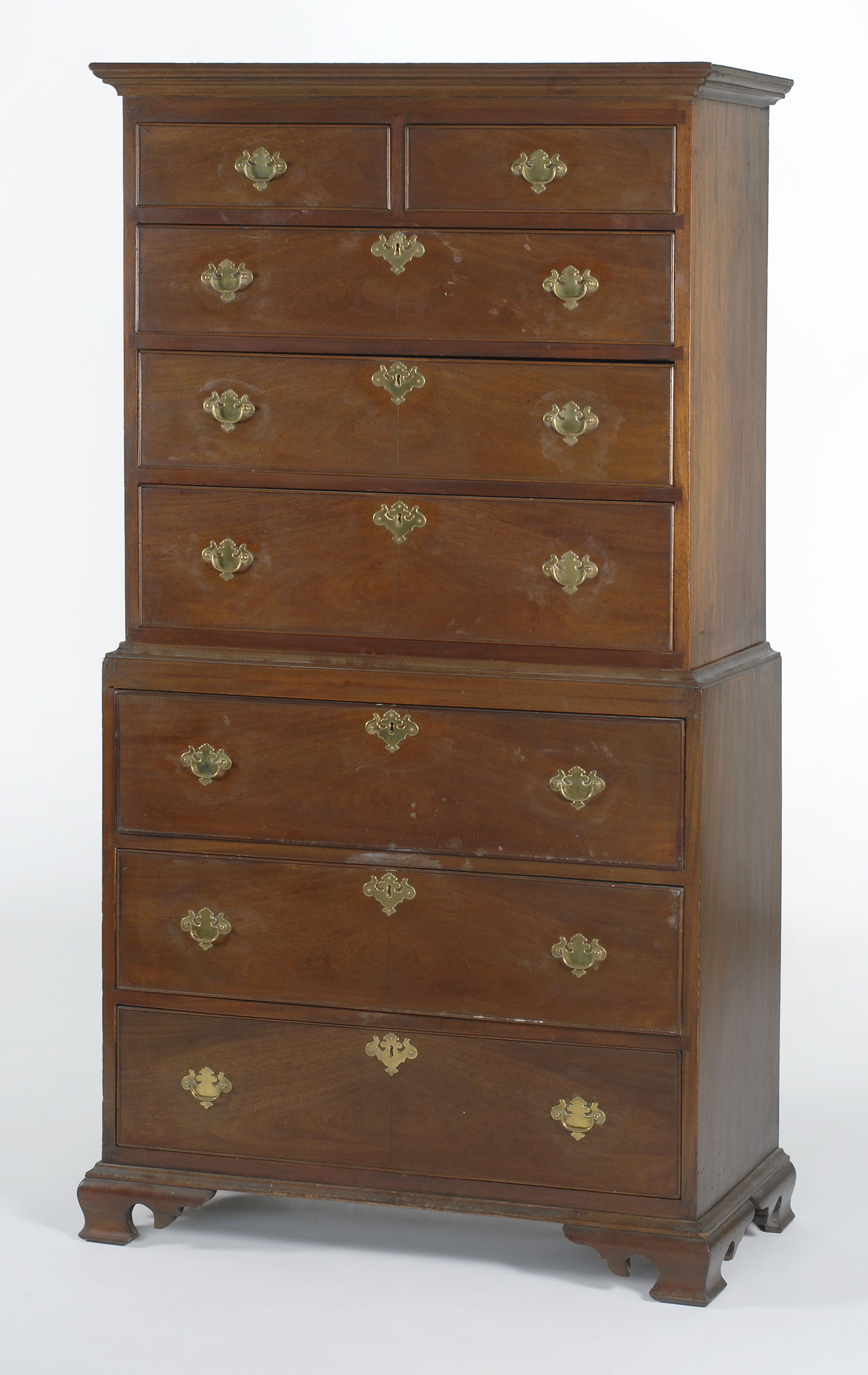 Appraisal: REPRODUCTION GEORGIAN-STYLE TWO-PART CHEST-ON-FRAME in mahogany and mahogany veneers Molded