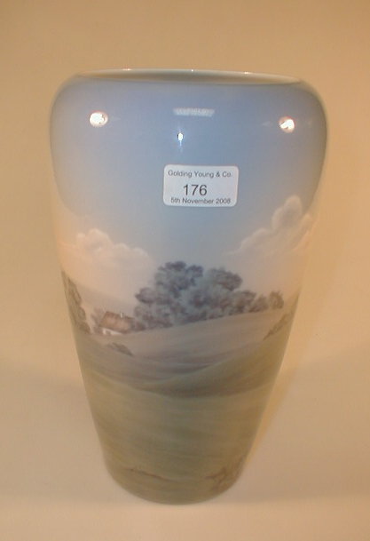 Appraisal: A Royal Copenhagen baluster vase with rural landscape scene decoration