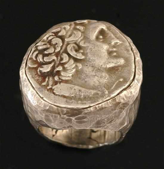 Appraisal: An ancient coin ring The hand crafted ring set with