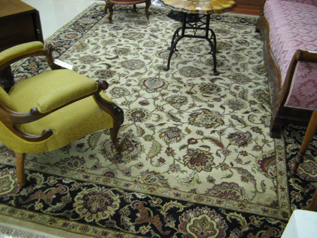 Appraisal: HAND KNOTTED ORIENTAL CARPET Persian Isfahan design of scrolling floral