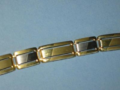 Appraisal: AN CT GOLD PANEL BRACELET some panels partly white gold