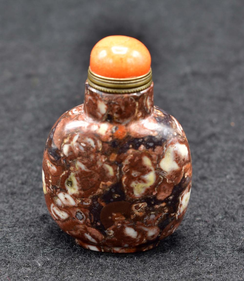 Appraisal: CHINESE MOTTLED TRI-COLORED AGATE SNUFF BOTTLEOf shaped circular form with