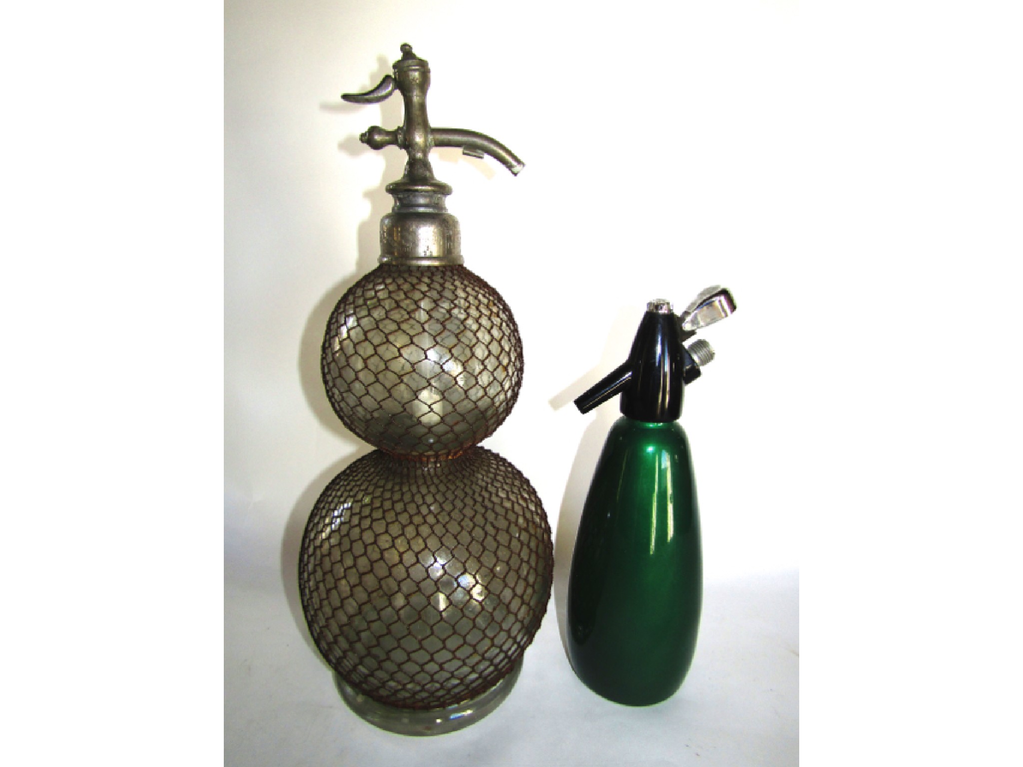 Appraisal: A substantial th century hand blown glass drinks syphon of