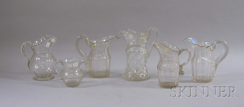 Appraisal: Six Colorless Pitchers with Applied Handles including blown and cut