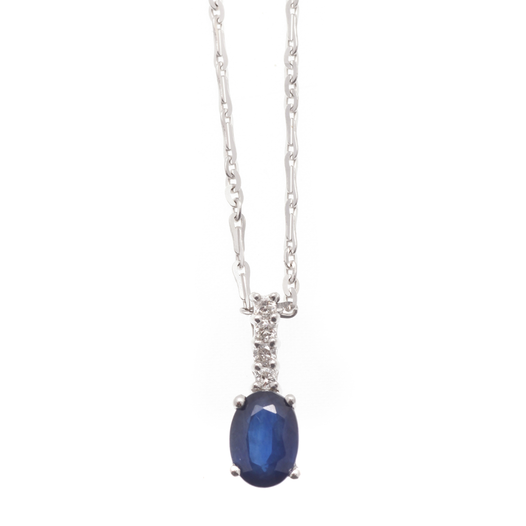 Appraisal: A sapphire and diamond set pendant claw set with an