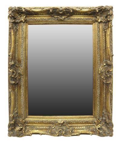 Appraisal: Decorative giltwood mirror late th c having elaborately carved deep