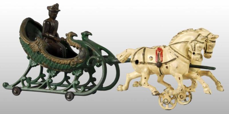 Appraisal: Cast Iron Hubley Sleigh Horse-Drawn Toy Description American Two horse