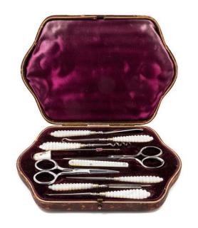 Appraisal: An English Silver and Mother-of-Pearl Sewing Kit the leather case