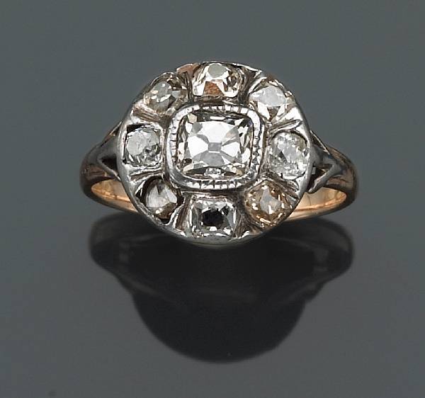 Appraisal: A Georgian diamond ring set with mine-cut diamonds mount in