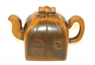 Appraisal: A Japanese Terra Cotta Teapot with Seal on Base in