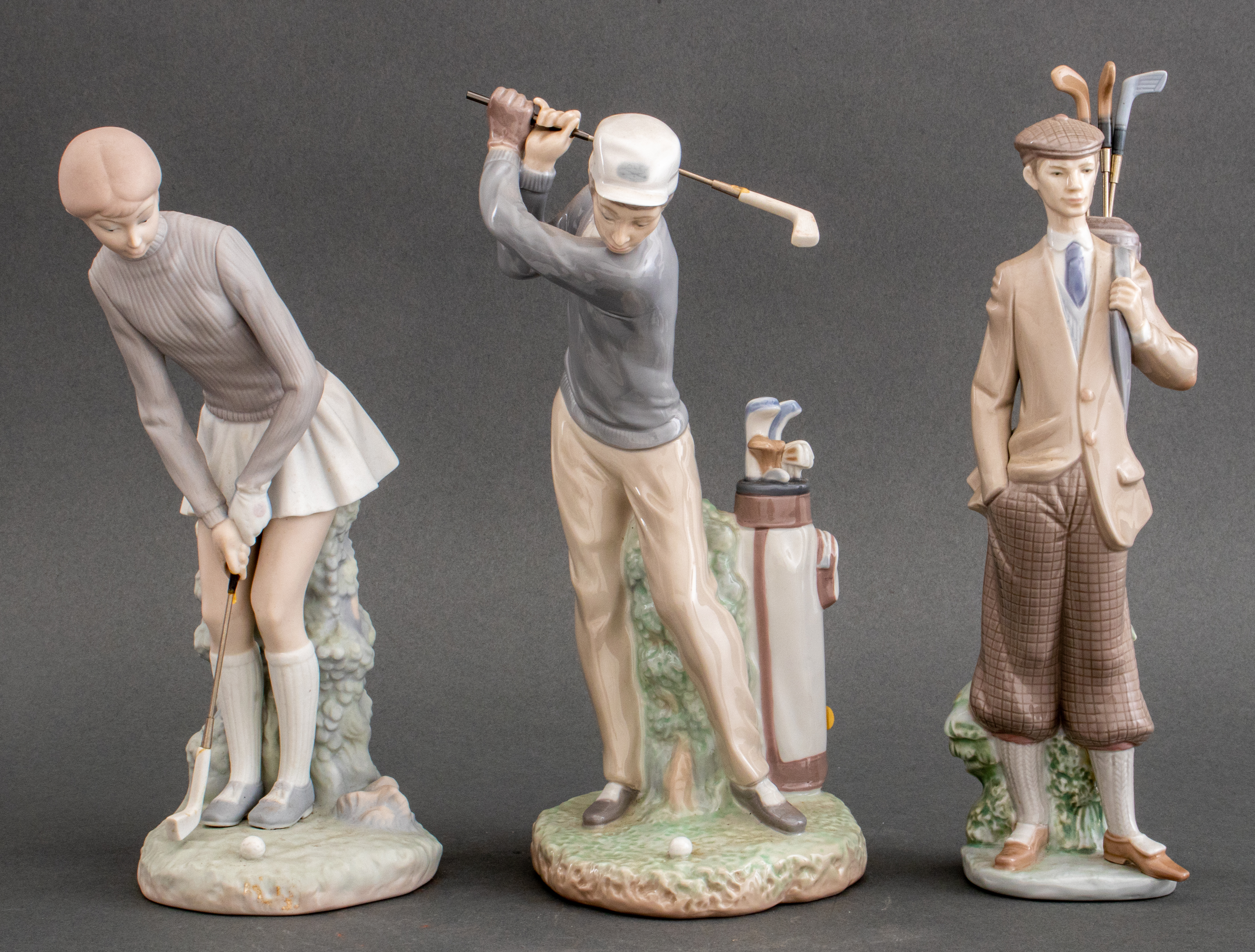 Appraisal: LLADRO GOLF PORCELAIN FIGURINE GROUP OF Group of three Lladro