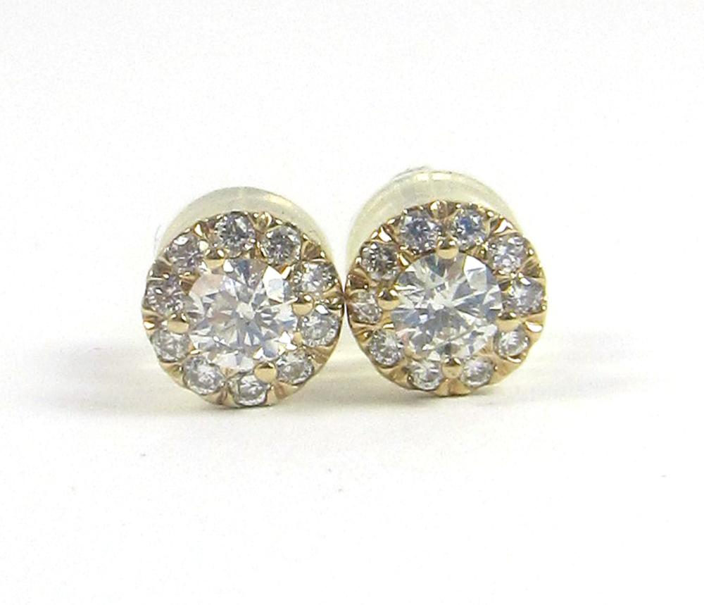 Appraisal: PAIR OF DIAMOND AND FOURTEEN KARAT GOLD EAR STUDS each