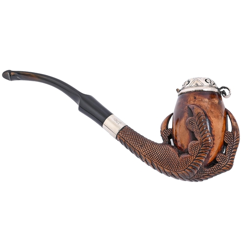 Appraisal: A Continental silver mounted carved meerschaum eagle's claw tobacco pipe