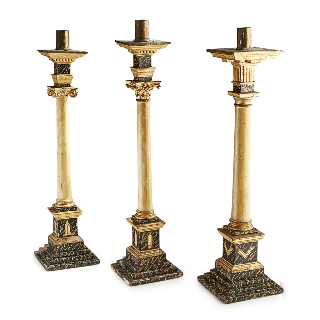 Appraisal: THREE PAINTED AND PARCEL GILT WOOD AND GESSO CANDLESTICKS OF