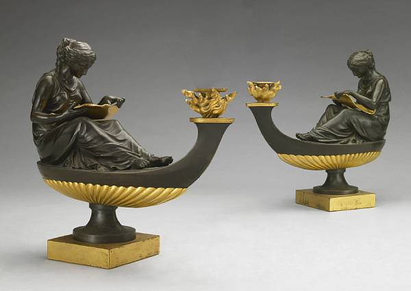 Appraisal: A pair of Louis XVI style gilt and patinated bronze