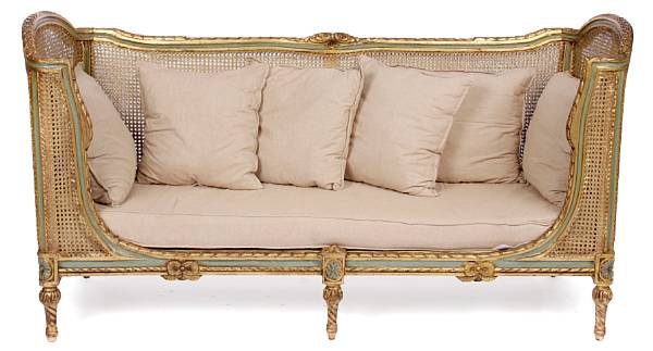 Appraisal: A Louis XVI style caned and parcel giltwood sofa with