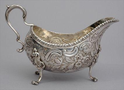 Appraisal: IRISH GEORGE III ARMORIAL SILVER TRIPOD SAUCE BOAT John Karr