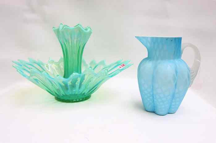 Appraisal: TWO ART GLASS PIECES an opalescent green epergne bowl the