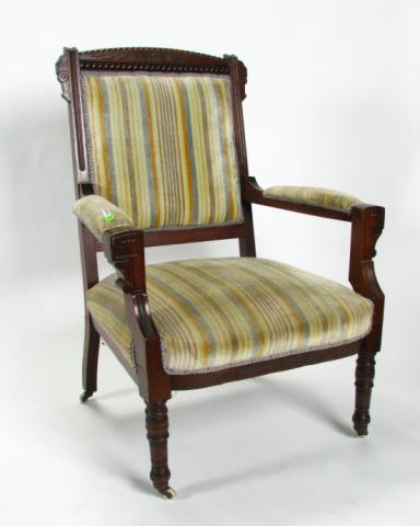 Appraisal: Eastlake Victorian arm chair carved walnut frame padded upholstered seat