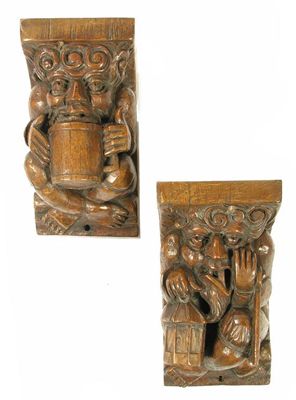 Appraisal: A pair of carved oak wall brackets with grotesque figures