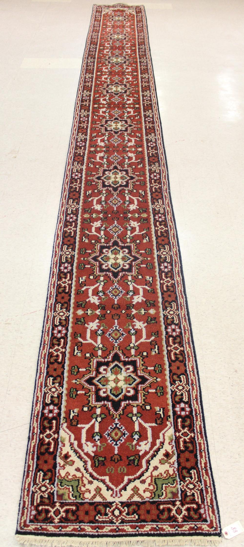 Appraisal: HAND KNOTTED ORIENTAL LONG RUG Persian Serab design having eight