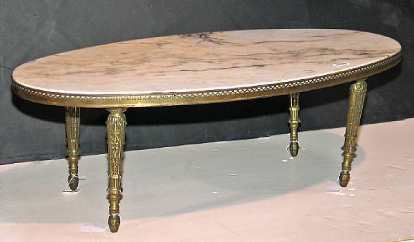 Appraisal: A Neoclassical style gilt bronze mounted marble coffee table mid