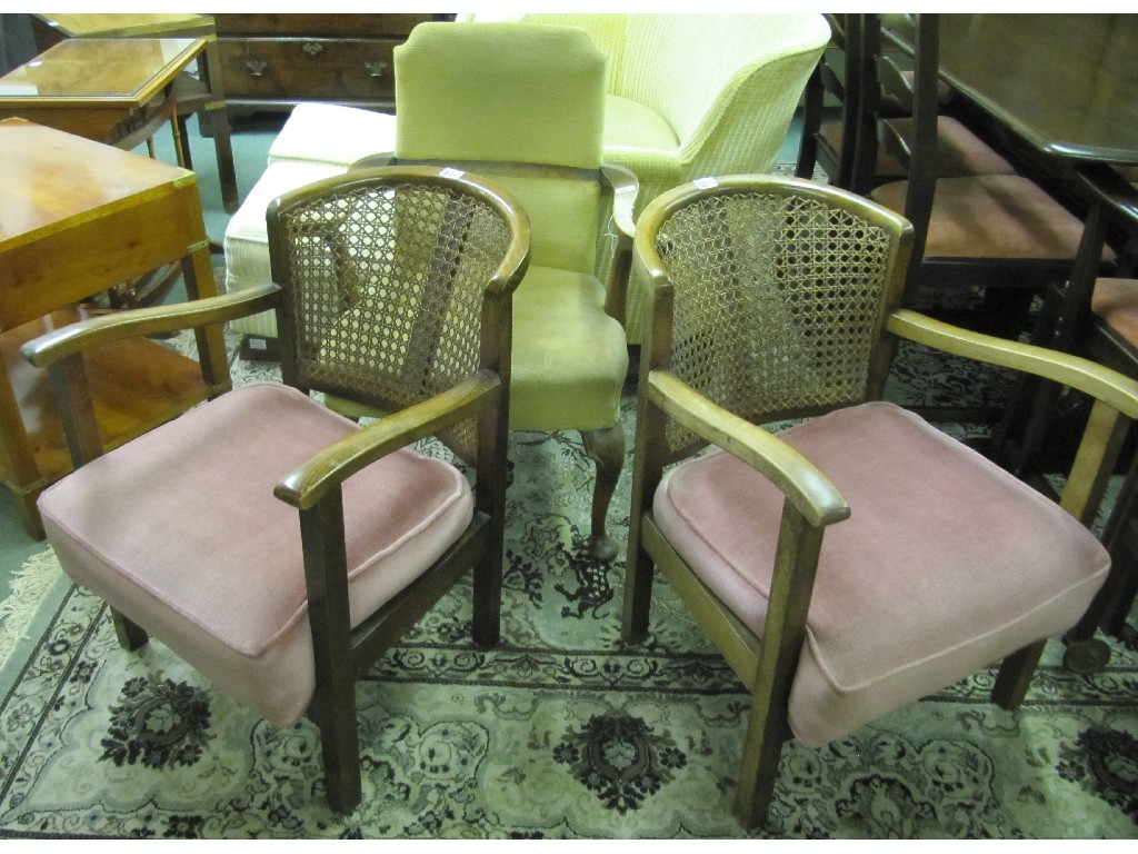 Appraisal: Pair of Bergere armchairs and an Art Deco carver chair