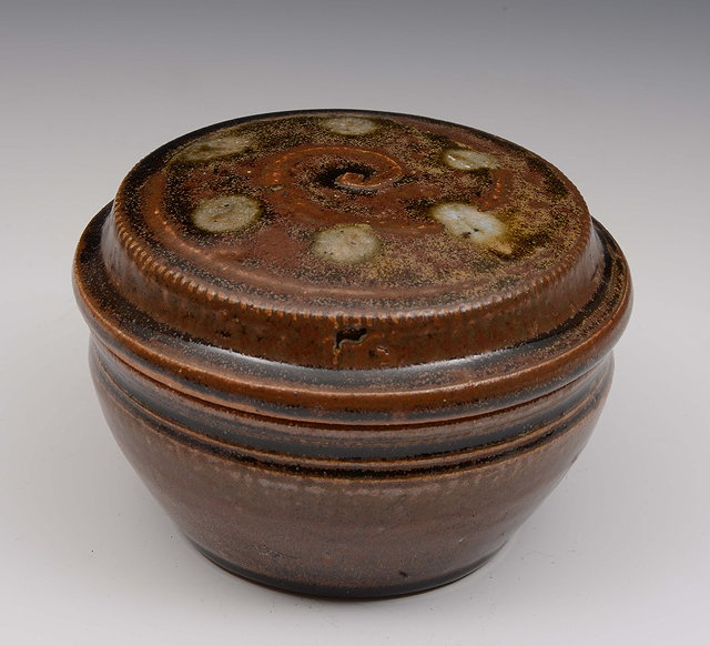 Appraisal: Mike Dodd British b Pot and cover tenmoku impressed potter's