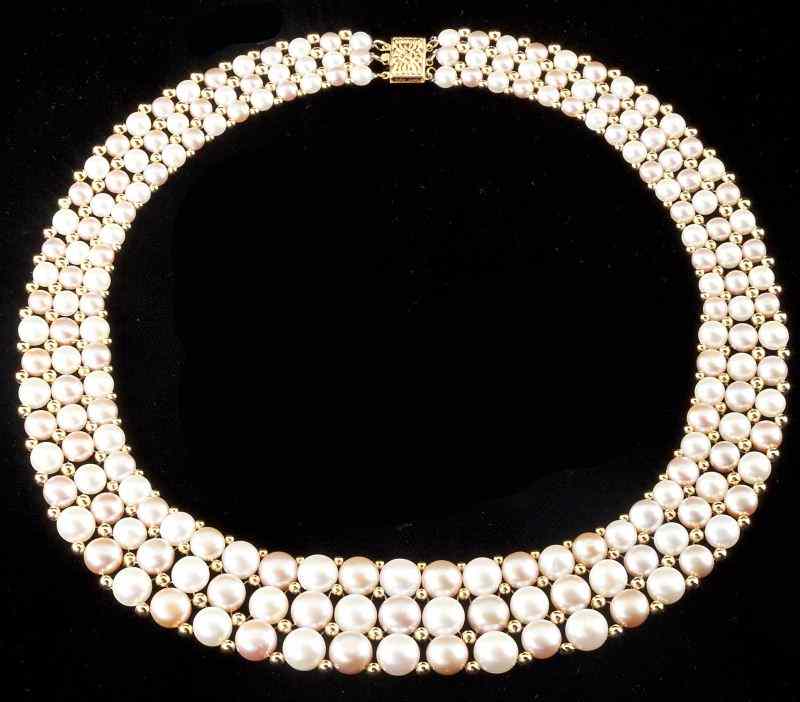 Appraisal: Gold and Freshwater Pearl Chokerdesigned as a three-strand choker comprised