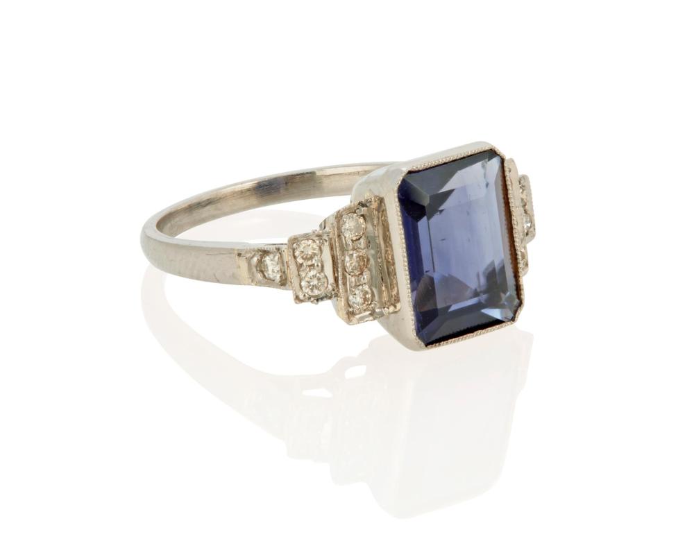 Appraisal: AN IOLITE AND DIAMOND RINGAn iolite and diamond ring k