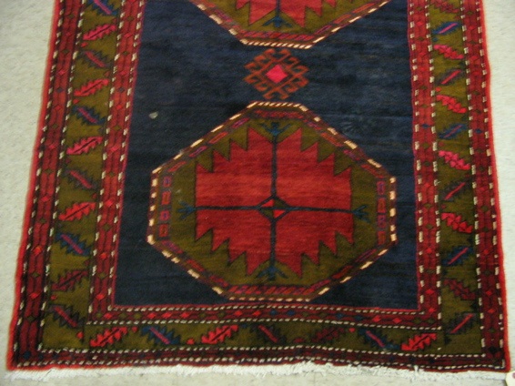 Appraisal: PERSIAN AZAR HALL CARPET hand knotted in a four geometric