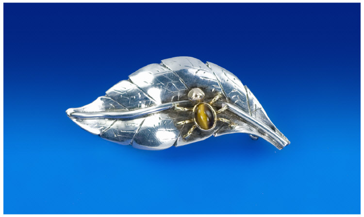 Appraisal: An Oriental Silver Yellow Metal and Tigers Eye Leaf Brooch