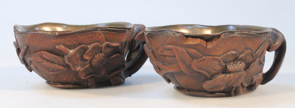 Appraisal: Two thC rosewood cups each shaped squat bowl with metal