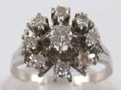 Appraisal: A French hallmarked carat white gold diamond cluster ring size