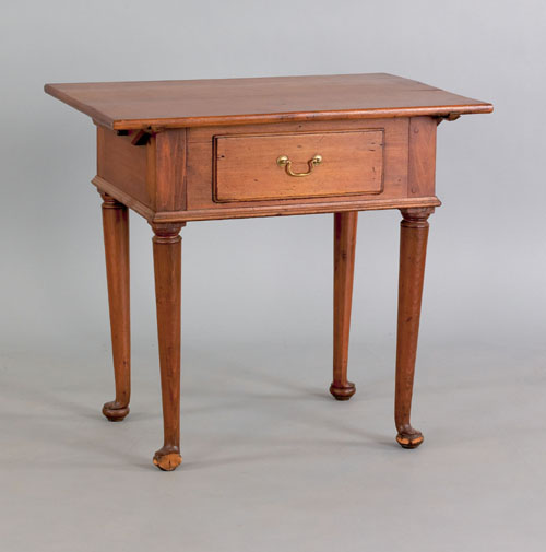 Appraisal: Pennsylvania diminutive walnut and cherry tavern table mid th c