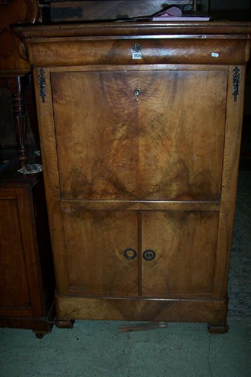 Appraisal: A th century walnut secretaire abbatant with fitted interior two