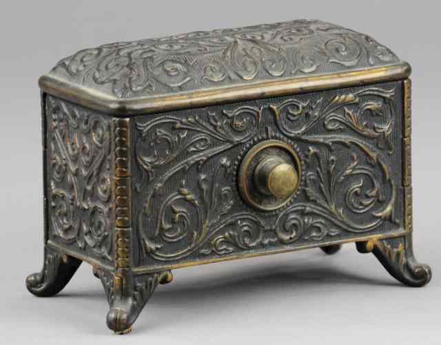 Appraisal: JEWEL CHEST STILL BANK Cast iron bank also known as