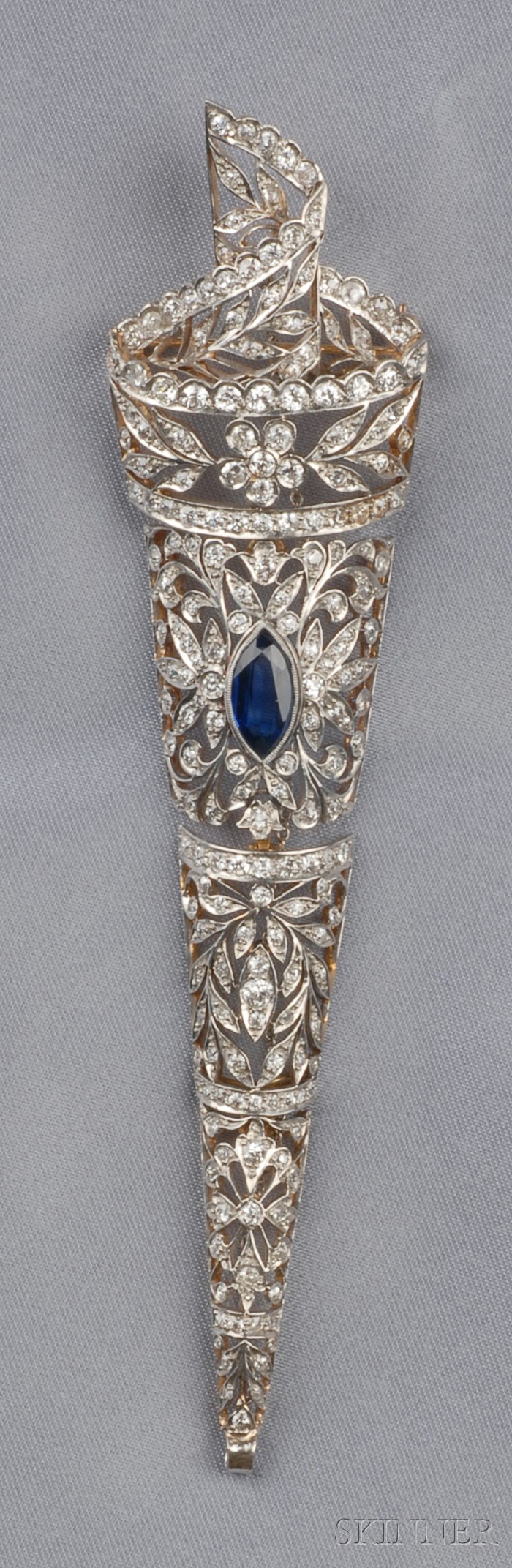 Appraisal: Diamond and Sapphire Pendant Brooch bezel-set with a marquise-cut sapphire