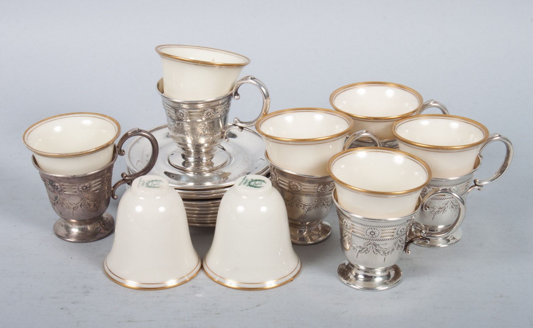 Appraisal: Six American sterling silver demitasse cup holders together with sterling