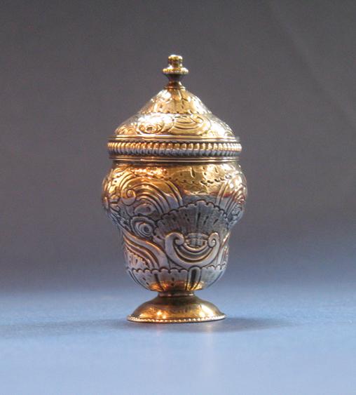 Appraisal: A GEORGE III NUTMEG GRATER of vase form the pull-off