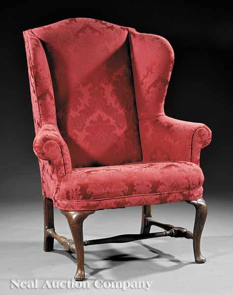 Appraisal: An American Colonial Mahogany Wing Chair partially re-constructed antique elements