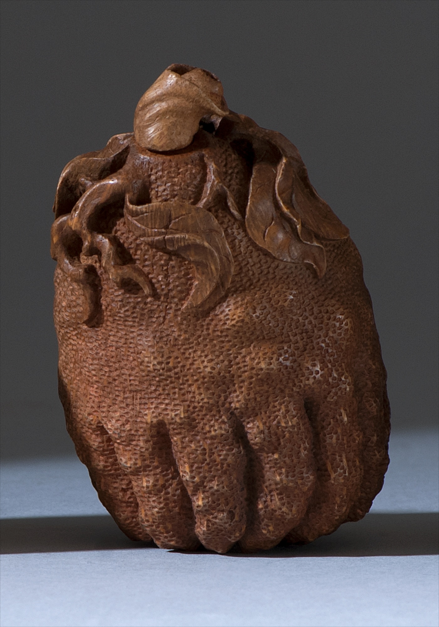 Appraisal: CARVED WOOD SNUFF BOTTLE Circa In Buddha's hand fruit form