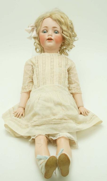 Appraisal: A German bisque head child doll Weighted glass eyes hand