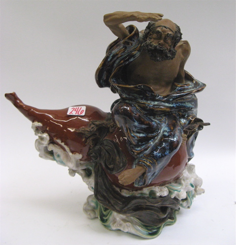 Appraisal: CHINESE POTTERY GLAZED FIGURE the barefoot nearly skeletal man with