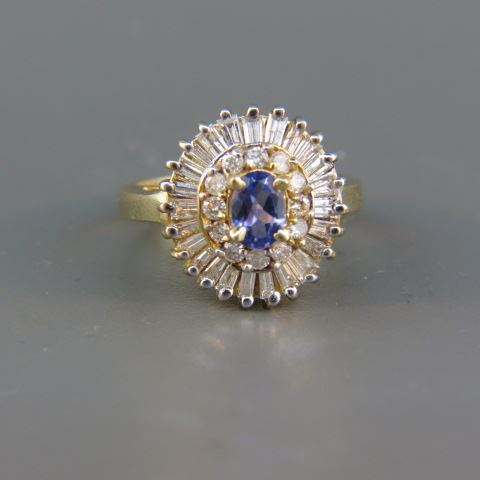 Appraisal: Tanzanite Diamond Ring oval gem weighing carat surrounded by round