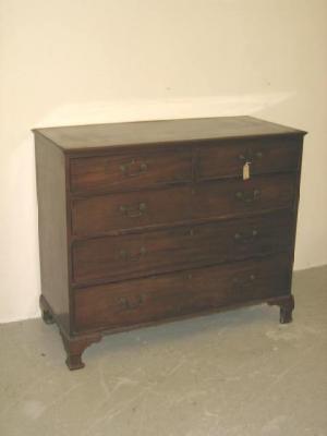 Appraisal: A MAHOGANY CHEST of two short and three long cockbeaded