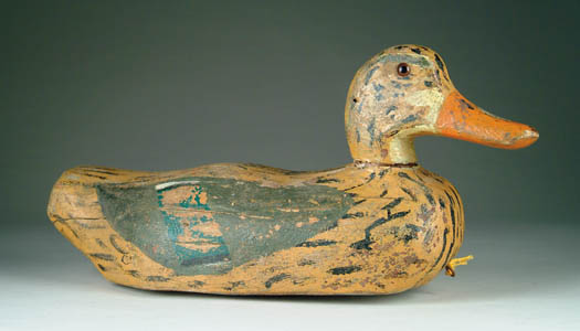 Appraisal: PAINT DECORATED AND CARVED DECOY Tan body with green wings